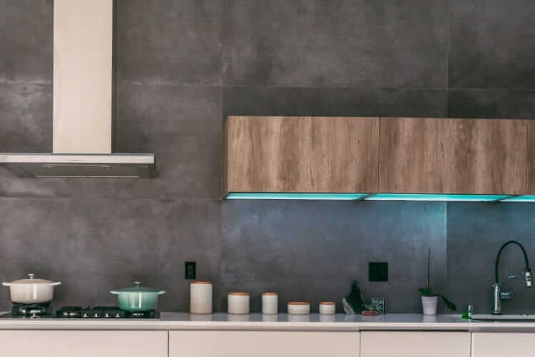 Modern industrial kitchen with concrete wall
