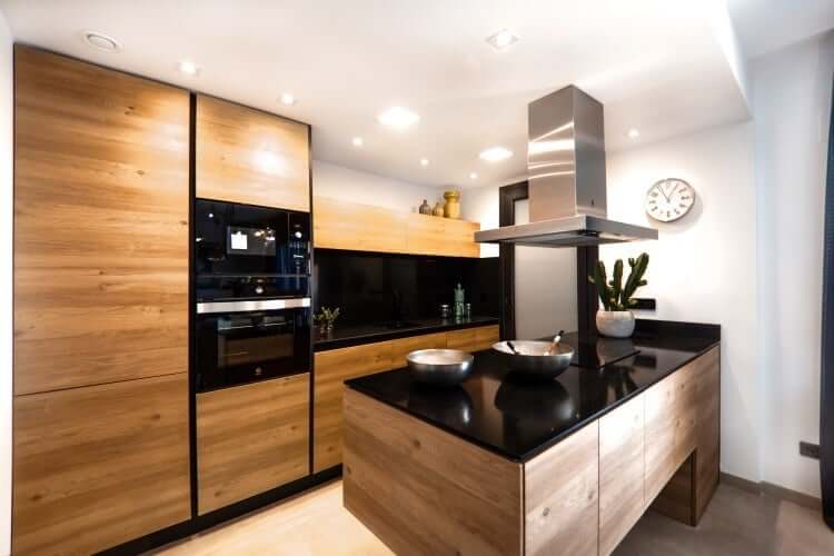 Black and wooden kitchen design with slab cupboard doors